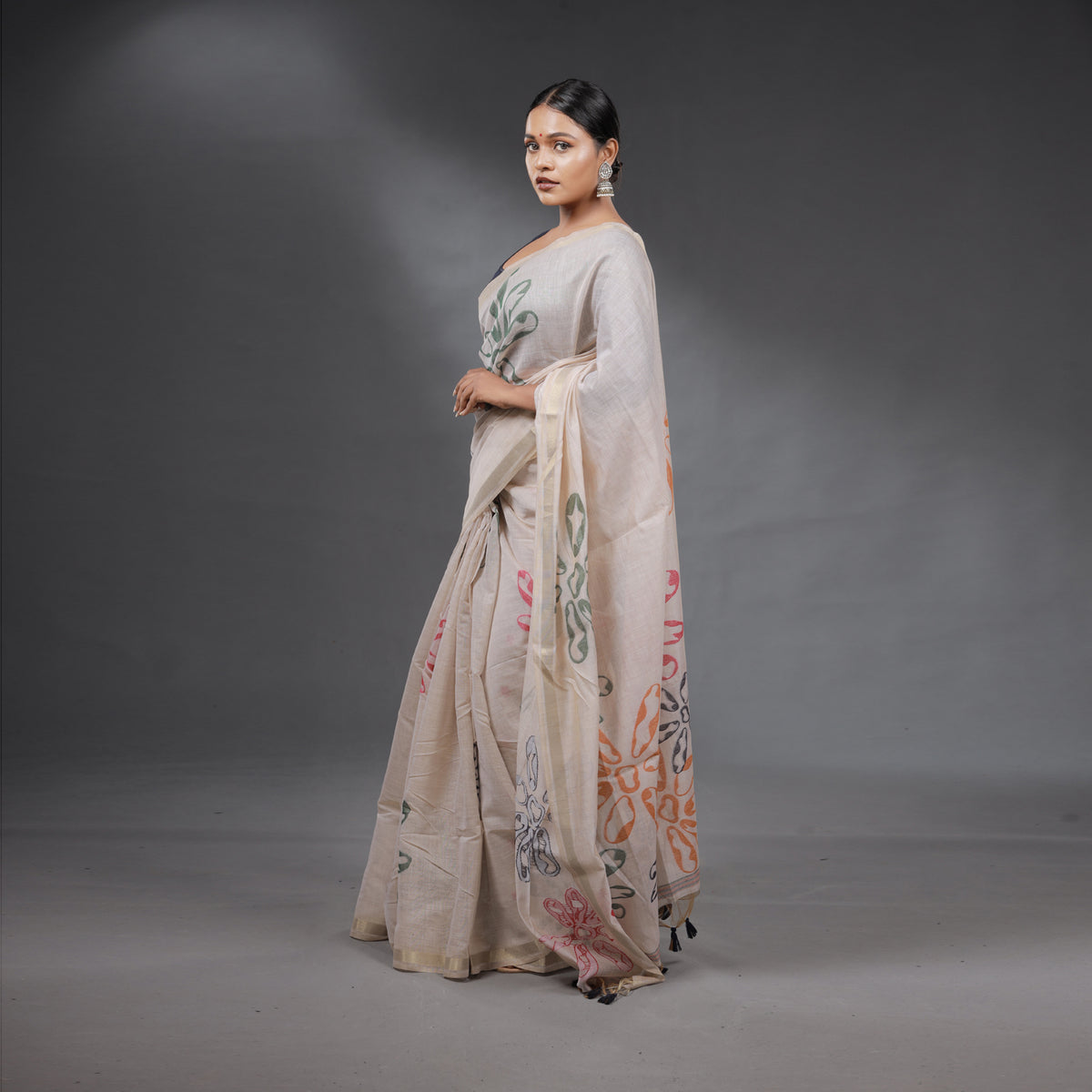 Ivory Handcrafted Floral Saree with Tassel Pallu
