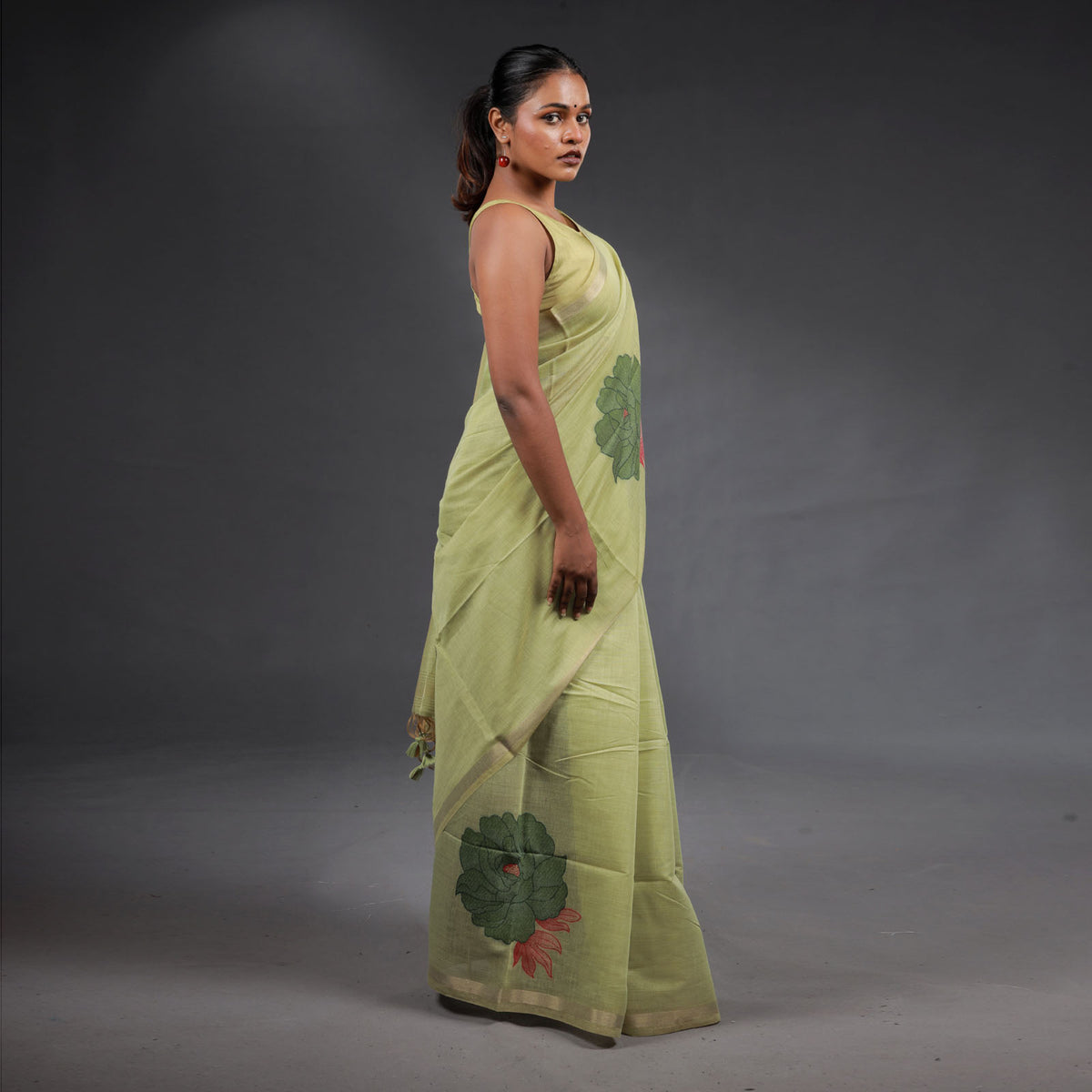 Pistachio Green Handwoven Cotton Saree with Floral Motifs