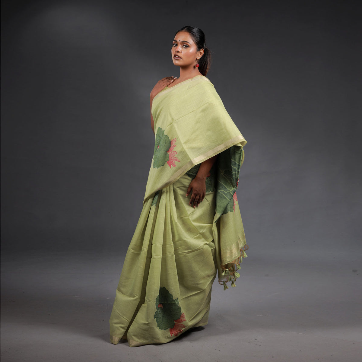 Pistachio Green Handwoven Cotton Saree with Floral Motifs