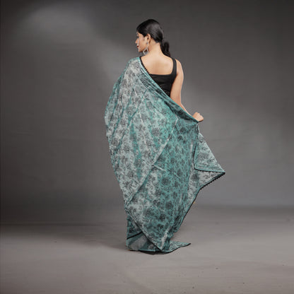 Aqua Blue Hand Block Printed Linen Cotton Saree with Black Floral Motifs