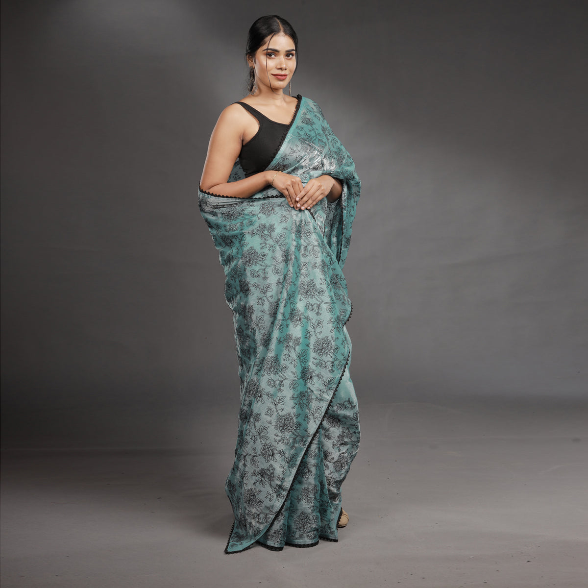 Aqua Blue Hand Block Printed Linen Cotton Saree with Black Floral Motifs