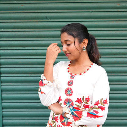 Ivory Blossom Printed Cotton Kurta Set with Tassel Detailing