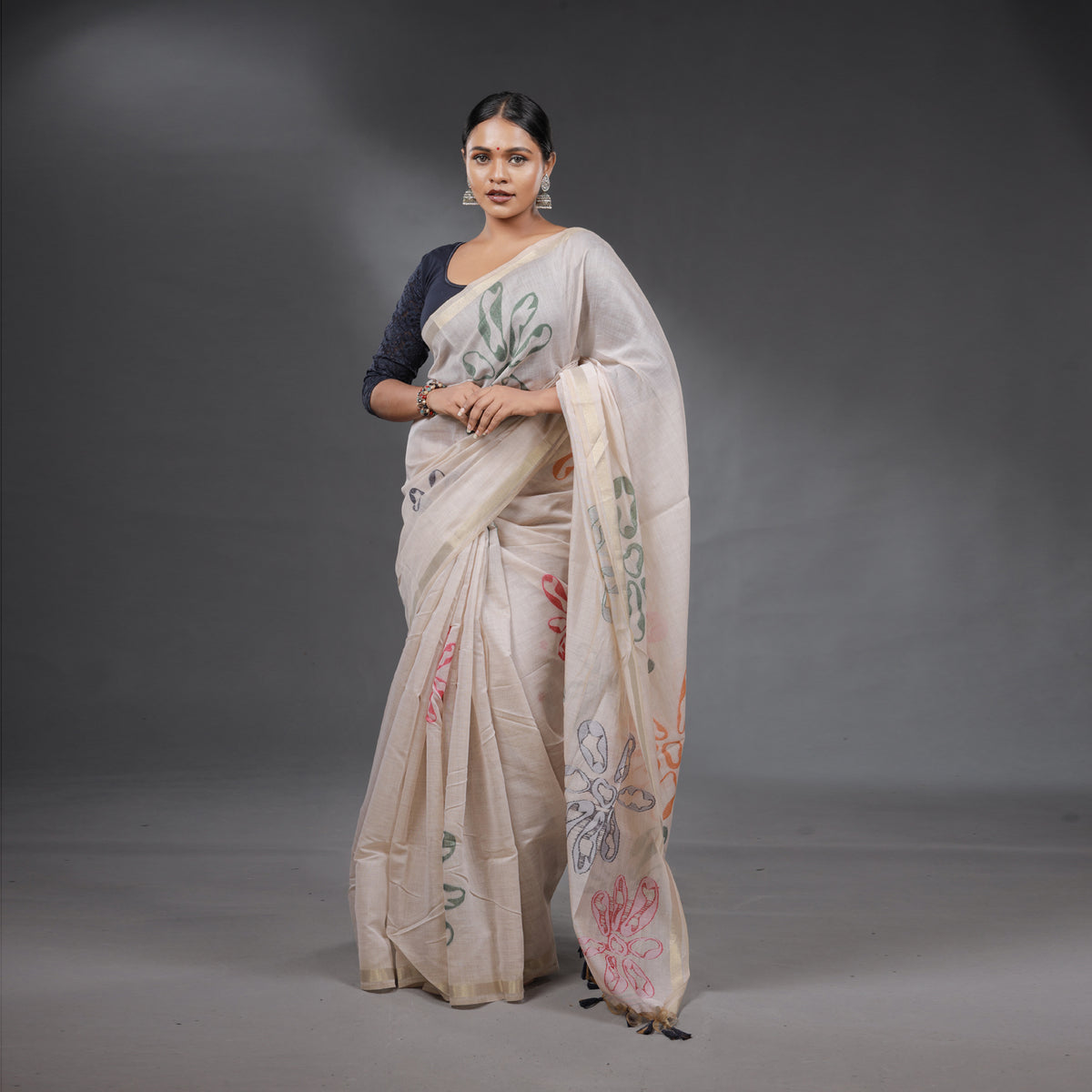 Ivory Handcrafted Floral Saree with Tassel Pallu