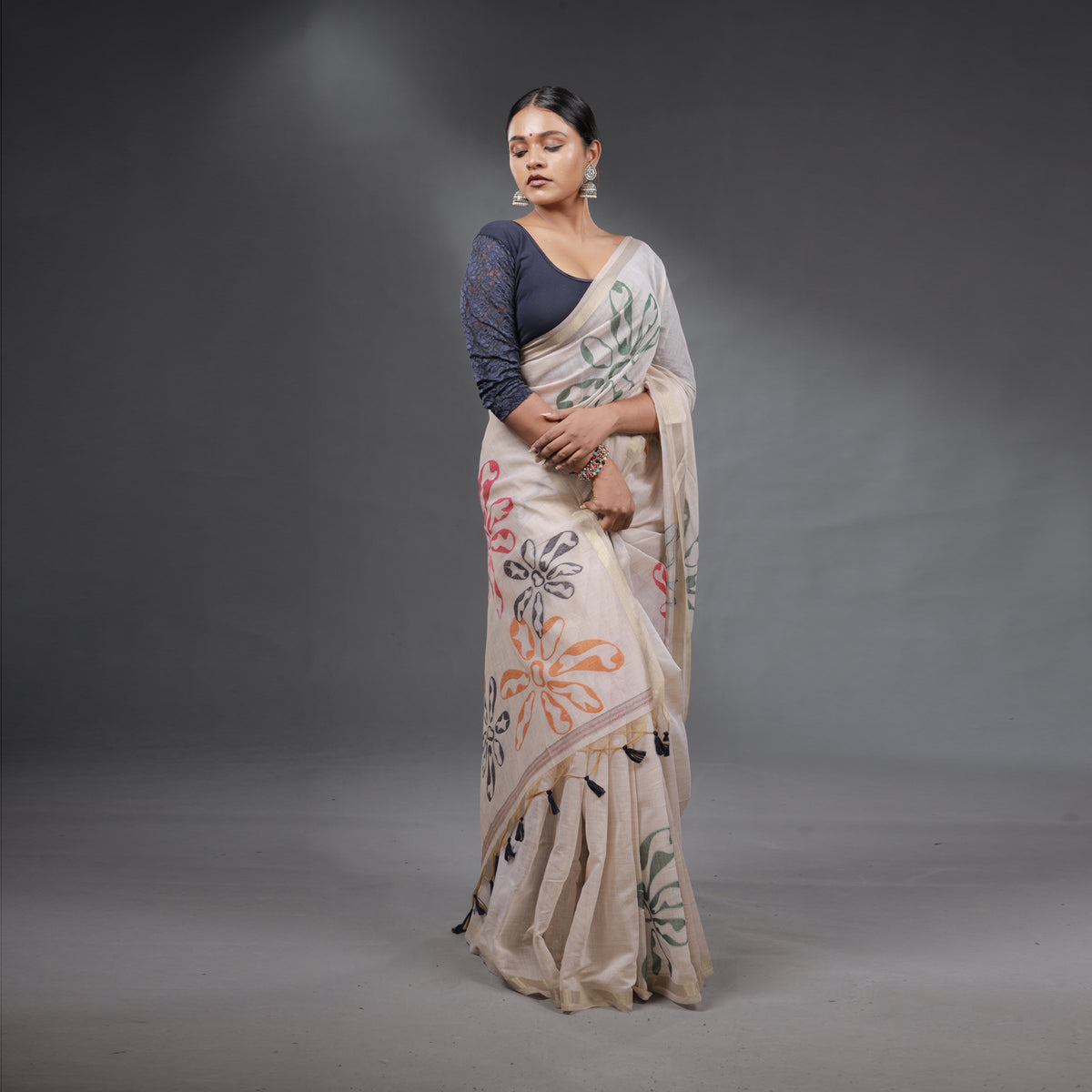 Ivory Handcrafted Floral Saree with Tassel Pallu